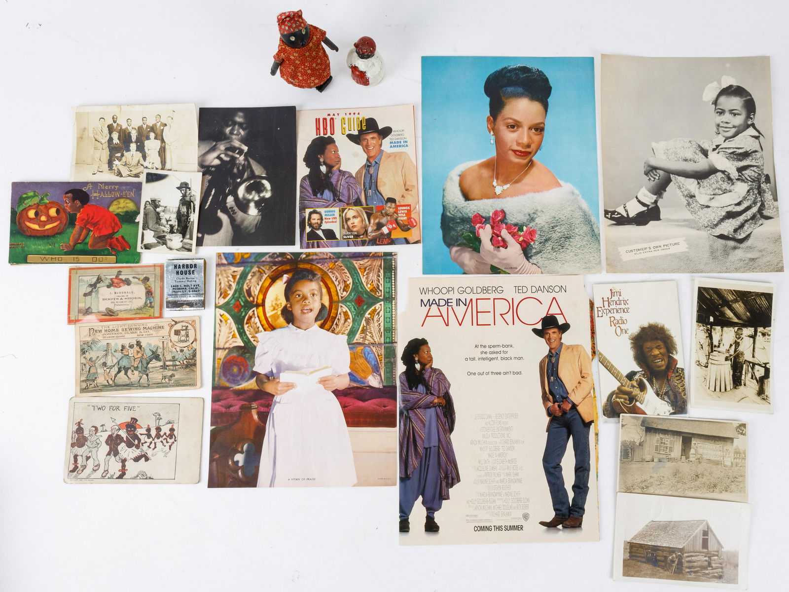 Black Americana, Postcards, Coffee Cards, Holiday: Black Americana including painted metal salt shaker with cork, 'walking' doll, matchbook with figure matches, Halloween, Jimi Hendrix and other postcards, business card, photos (including Sharecropper
