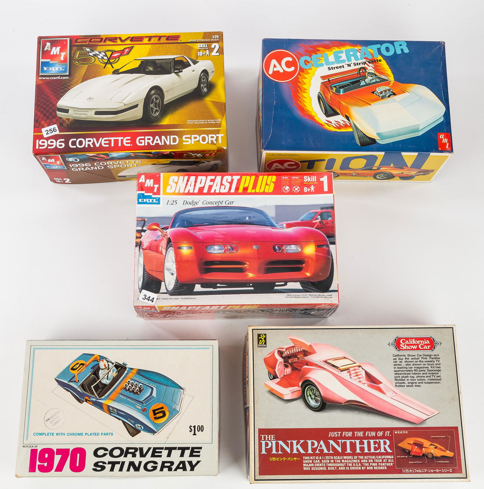 Vintage Scale Model Kits (5): Vintage scale models unbuilt in original boxes include AMT Snap Fast Dodge concept car 1/25 scale, box in mint condition (unopened), all parts intact/included, AMT 1996 corvette 1/25 scale, box in ver