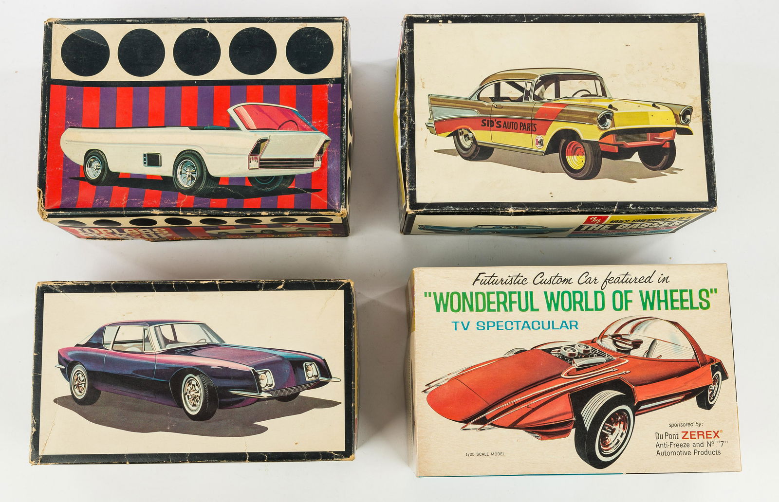 Vintage AMT Scale Model Cars (4): Vintage AMT scale model kits / cars in original boxes include topless pickup 1/25 scale, box in fair condition, all parts appear intact/included, Avanti Grand Turismon 1/25 scale, box in fair conditio