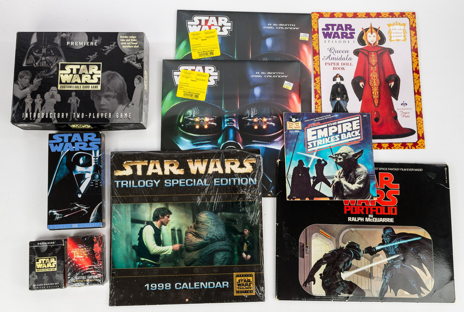 Vintage Star Wars Collectibles: Calendars NIP 2016 (2) and 1998 (1), VHS VCR Tape of A New Hope, Empire Strikes Back 45 RPM Record and Booklet c1980 record condition very good, Card Games "Young Jedi" and "Star Wars", Queen Amidala