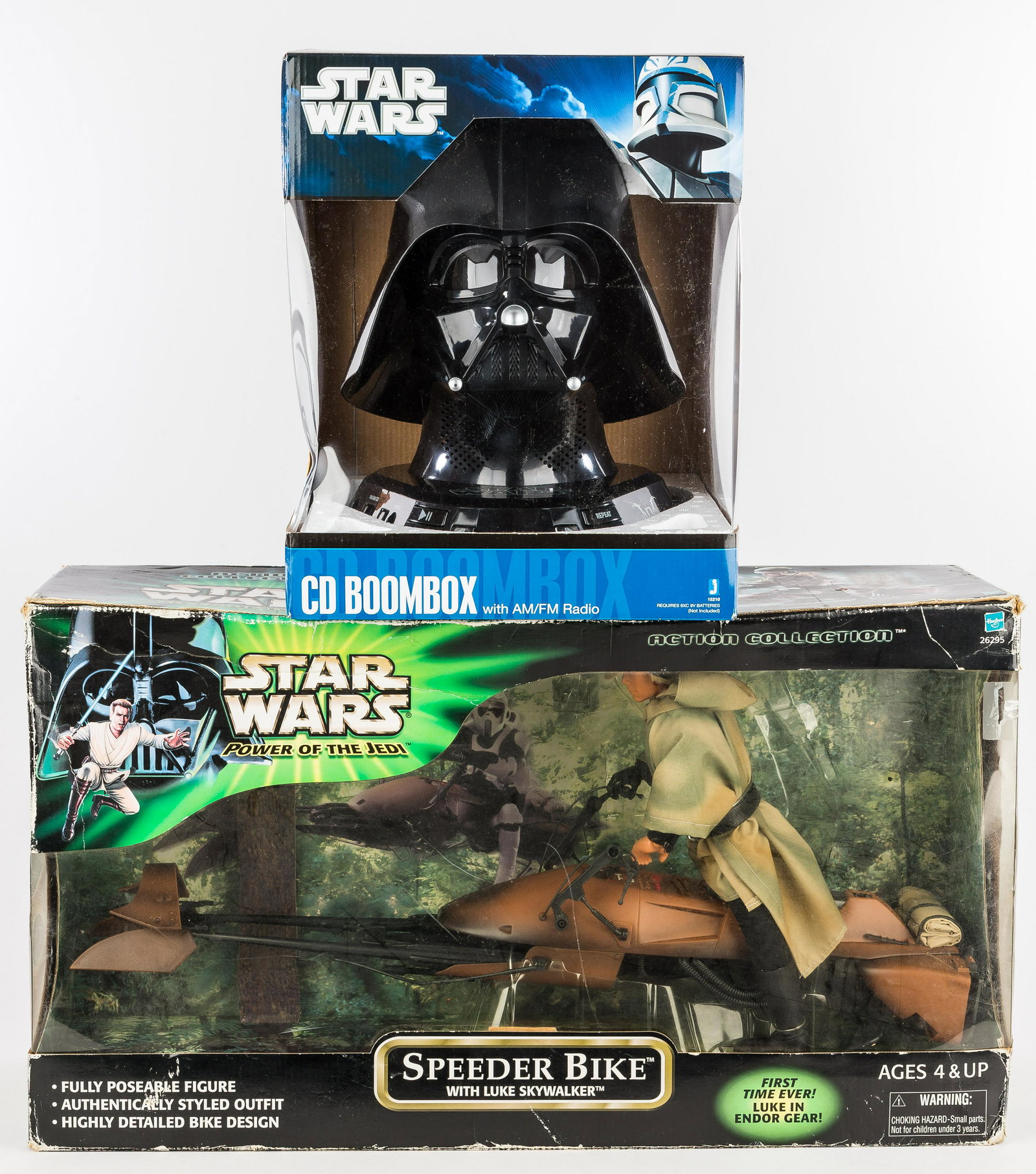 Vintage Star Wars Toy, Radio: Speeder Bike with Luke Skywalker c2001 item 26295 by Hasbro NIB unopened, box in poor condition; Star Wars Darth Vader CD Boom Box NIB very good condition.