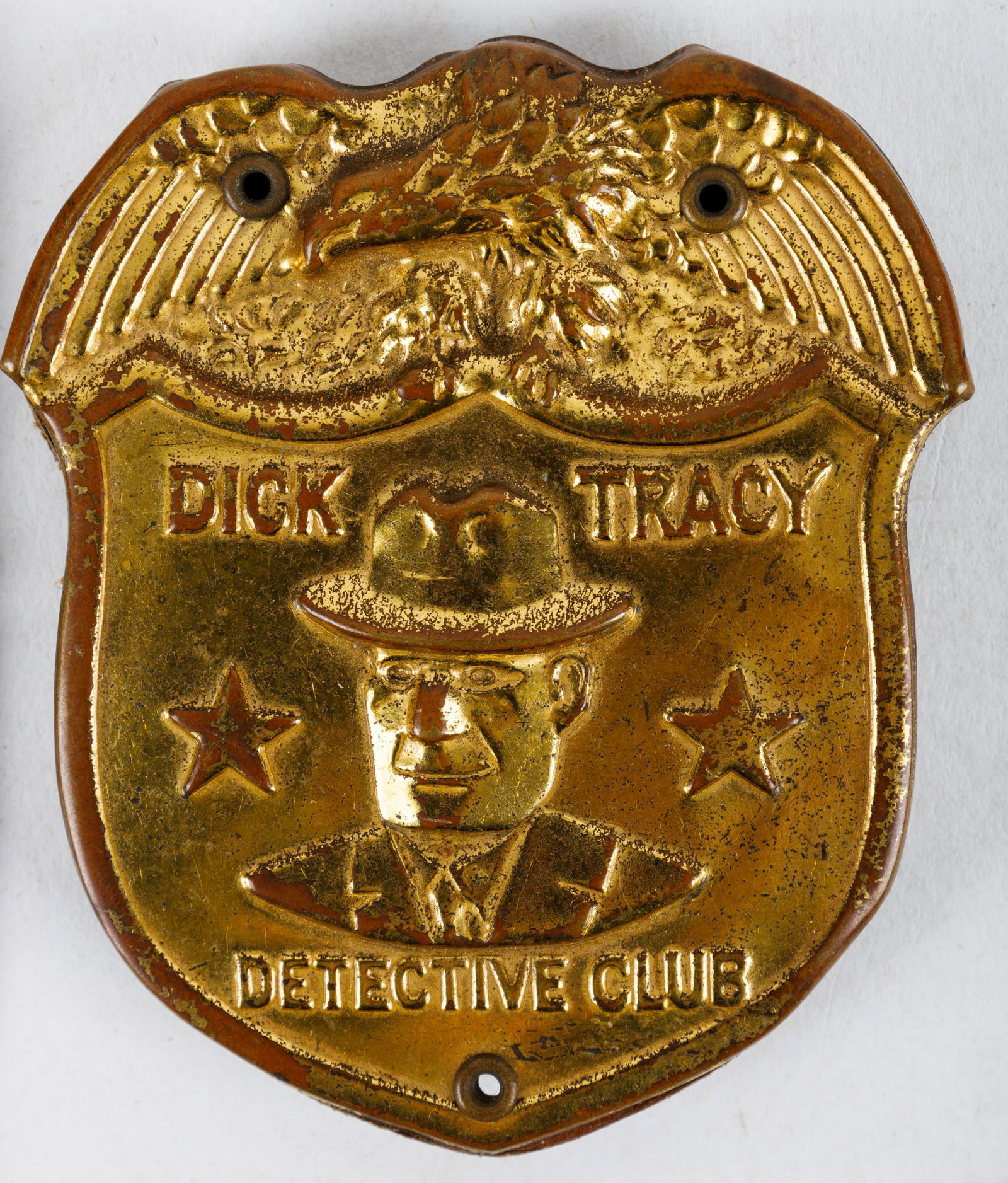 Dick Tracy Premiums, Badges: 1937 Dick Tracy Detective Club Shield Badge and on the reverse has leather coin pouch with snap closure, Detective Club patch round cloth, and Dick Tracy's Bonny Braids c1951 celluloid doll from the C