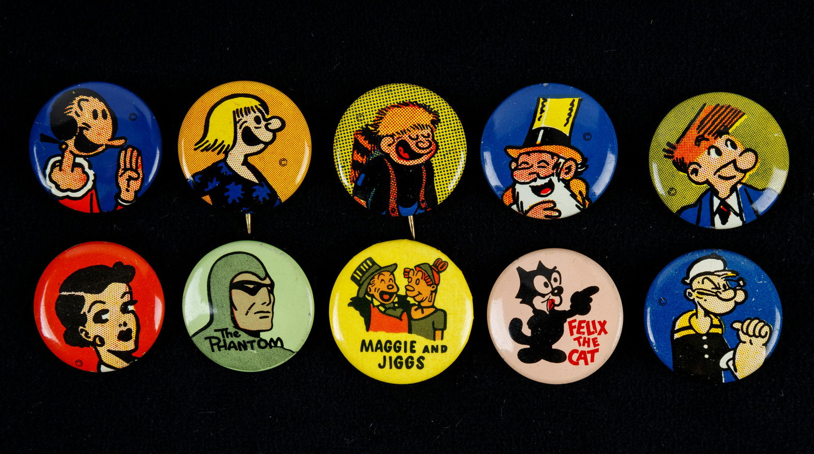 King Feature Pins (10): Two Popeye, Felix the Cat, Phantom, Maggie and Jiggs and other early cartoon. Est c 1940s.