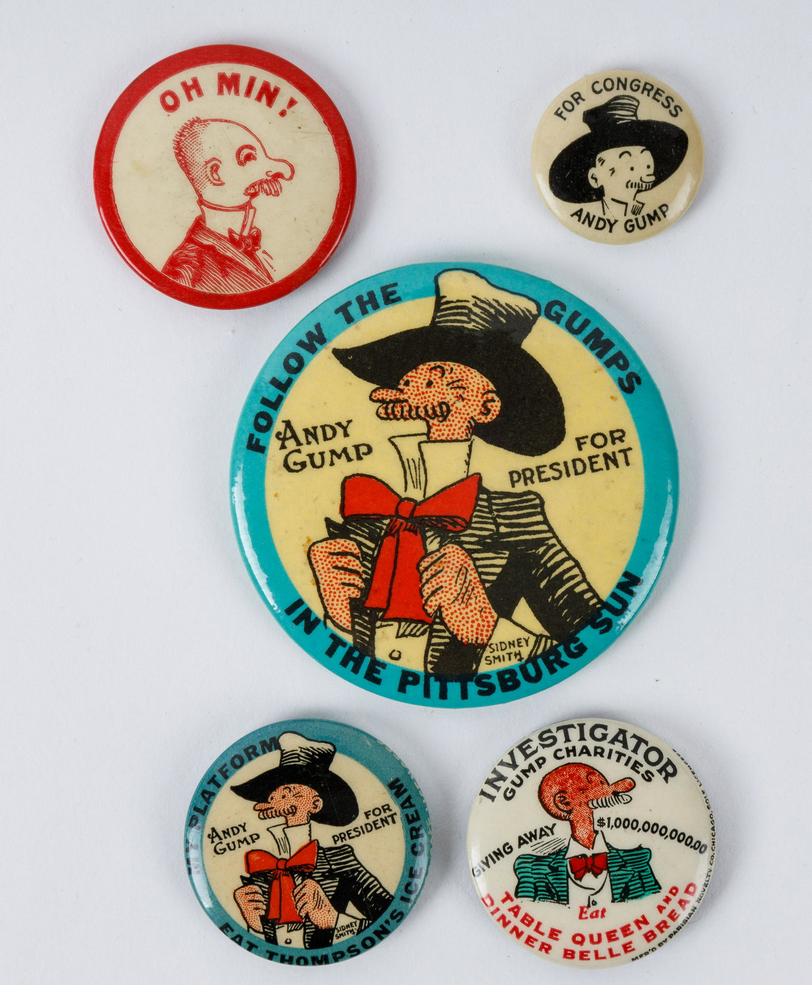 Andy Gump Pinbacks and Mirror (5): Largest is Follow the Gumps in the Pittsburg Sun (mirror on back), and 4 smaller pinbacks. Premiums for Fat Thompson's Ice Cream, Table Queen and Dinner Belle Bread, and others.