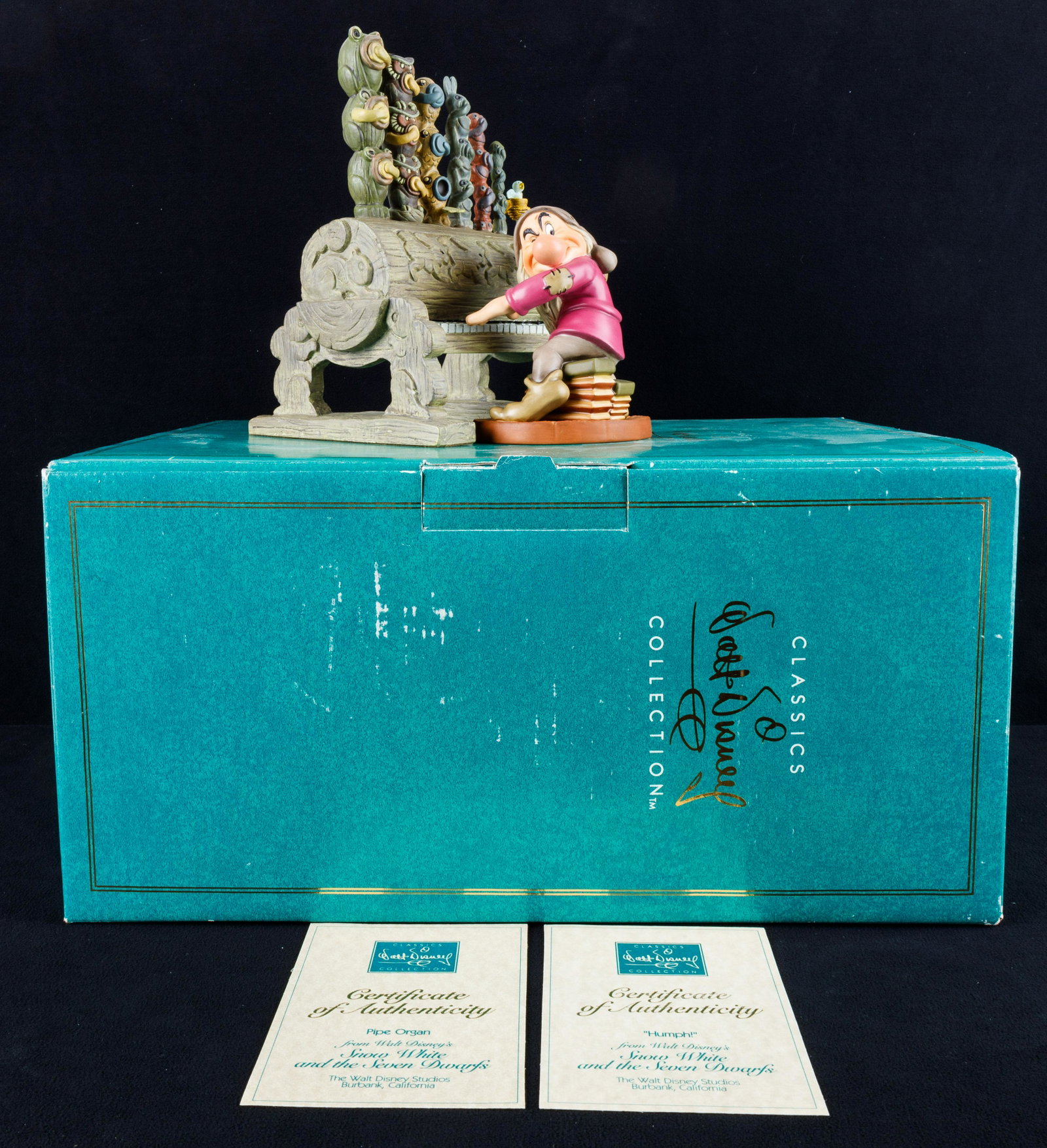 Walt Disney Classics Collection Grumpy Figure: Walt Disney Classics Collection 'Humph' Grumpy with pipe organ figure from Snow White and The Seven Dwarves, approx 8"H, in original box with COA.