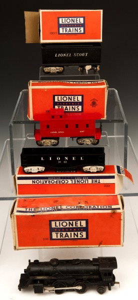 Train Lot: Lionel Locomotive #1110, Caboose # 1007, Gondola car #1002, Tender #1001T, Marx automatic block signal #44A, Box car #1004, Marx water tower #0165, transformer-type 1001 and 1 other