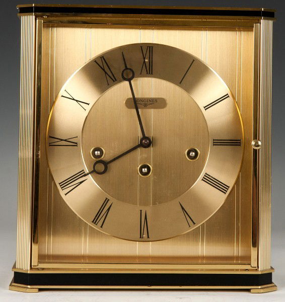 Mantle Clock, Logines: Longines gold tone mid-C modern mantle clock; works by Franz Hermle 8 day movement time strike; 9 1/2" h x 9" w x 5" d