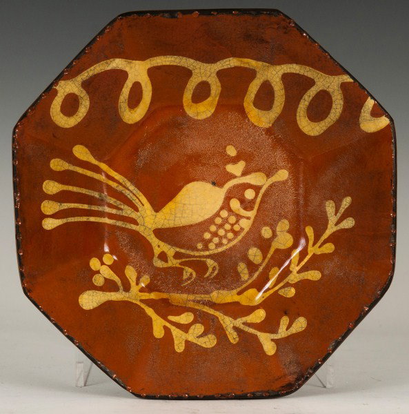 Turtlecreek Bowl: Contemporary redware bowl with slip decoration of a bird by Turtlecreek Pottery