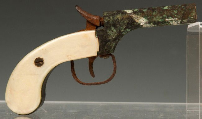 English Percussion cap pistol: English Double Barrel Percussion cap pistol found as a relic, frozen action, pearl handle