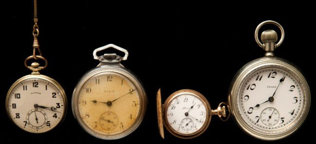 Four pocket watches: Four pocket watches. 1)Elgin silverode open face, 15J, #24434456, size 16, 2) Elgin stainless open face, 15J, #11525586, size 14, 3)Illinois g-f open face, 17J, #3936215, size 8 with chain, 4) Lady's