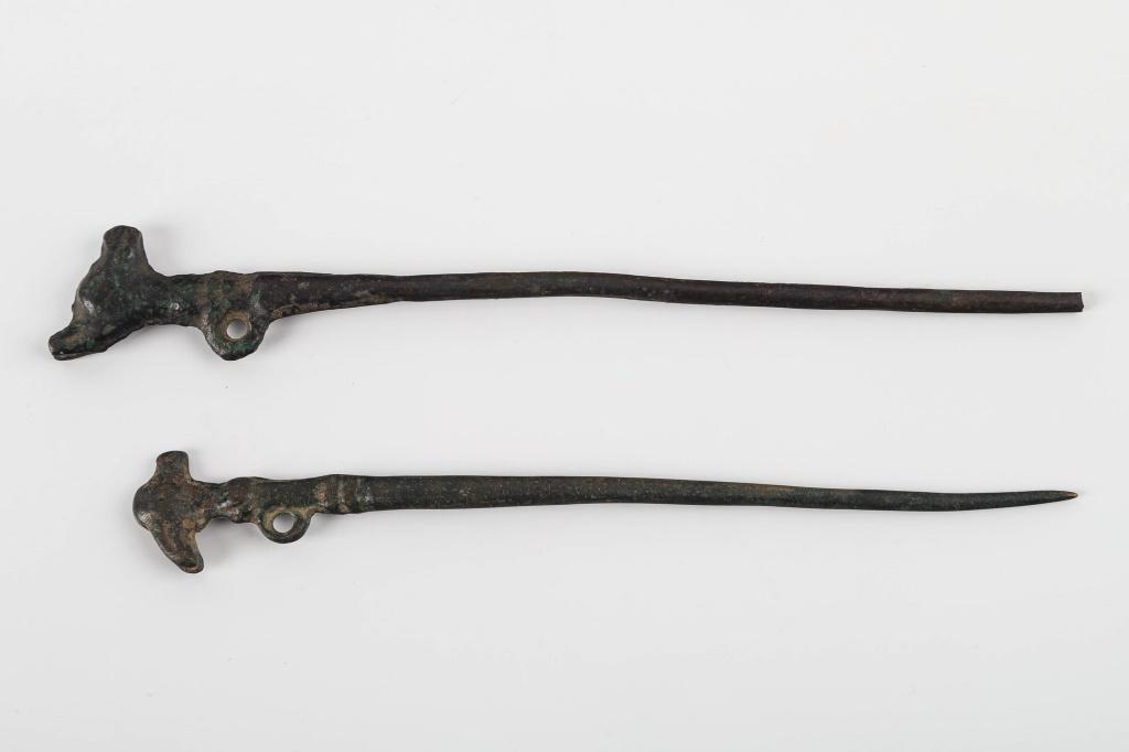 Inca Copper Pins (2): South American Inca copper pins, llama head on one and bird head on the other, used to fasten clothing. The pair have some weight at just over 1 oz.