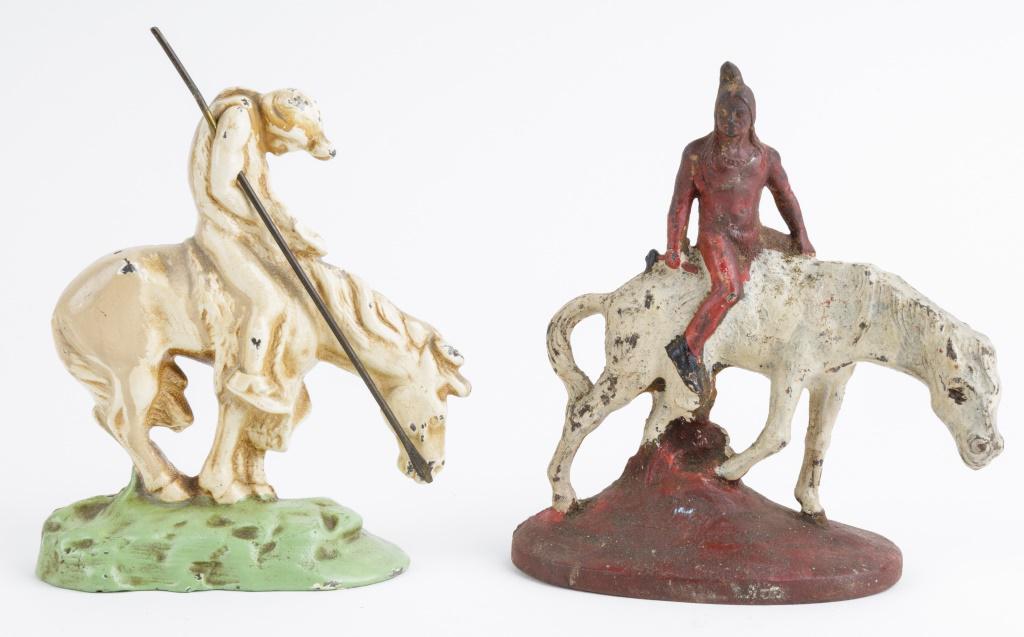Native American Cast Iron Door Stops: 2 Cast iron Native American door stops, with original paint, both figures mounted on horse, 1 with spear, 1 booking over shoulder, tallest approx 6.5"H.
