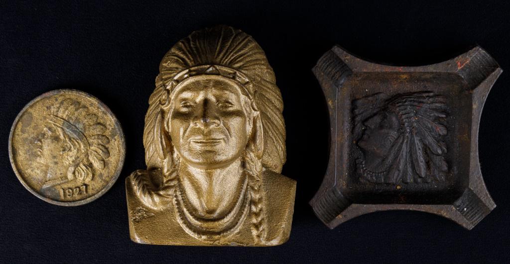 Cast Iron Native American Souvenirs: 3 Cast iron Native American souvenirs including 'Indian Head National Bank', ashtray with '708' on back, 1927 'Souvenir Penny of York PA' large coin.