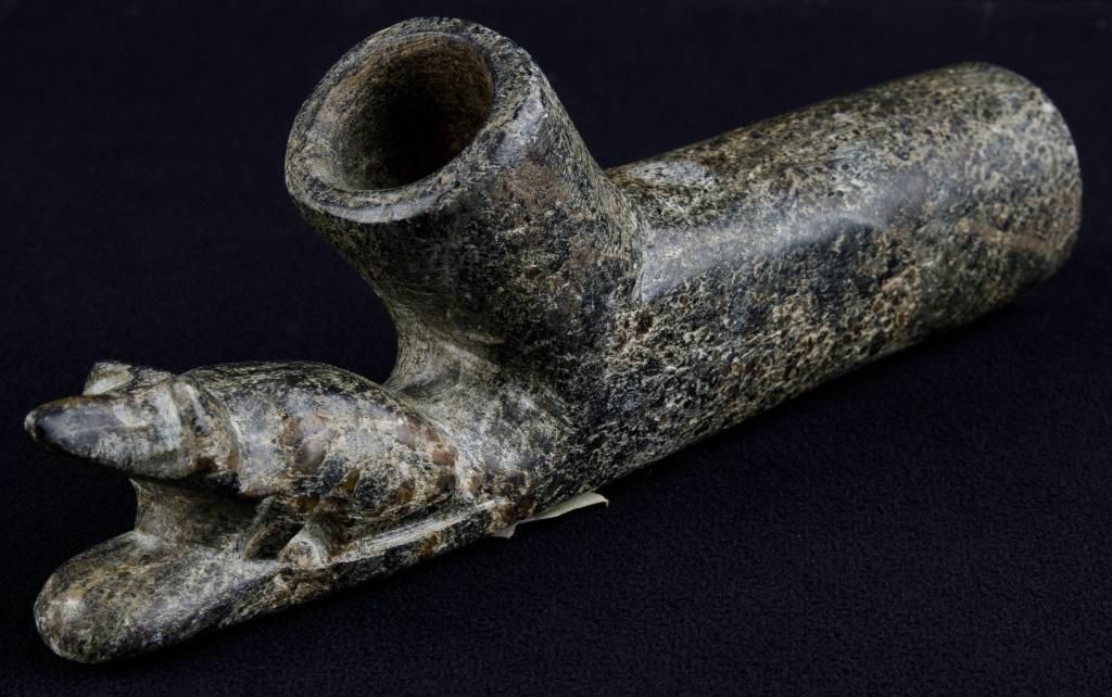 Native American Badger Pipe: Native American platform type pipe in a green steatite soapstone, depicting a sitting badger, from the EX Howards Mesnaad collection, approx 6.25"L.