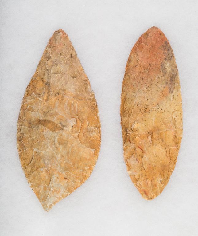 Neolithic Flint Knives (2): These are Neolithic leaf blade and one is approx 6" L x 1.5" D (thick) x 2.75" W, the other is approx 5.5" L x 3/8" D (thick) x 2" W. The leaf shape is a rare example and excellent condition for their