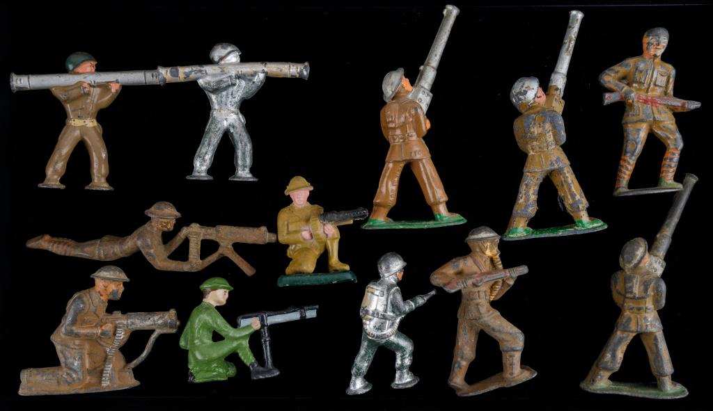 Barclay Manoil Military Toy Gunner Soldiers: 12 Cold painted lead Barclay Manoil toy gunner soldiers, some loss to paint, wear commensurate with age, largest approx 4"H, as seen in photos.