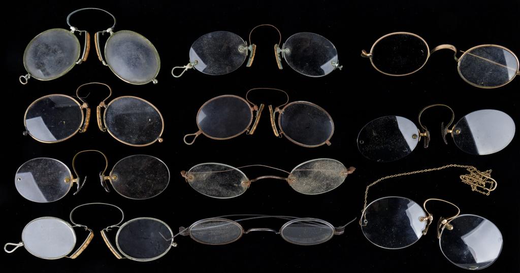 Antique Pince Nez & Other Glasses: 9 Pairs of pince nez eye glasses, 5 still with cork nose rests and 1 with chain, and 2 pairs of regular glasses, wear commensurate with age and use, sold as seen in photos.