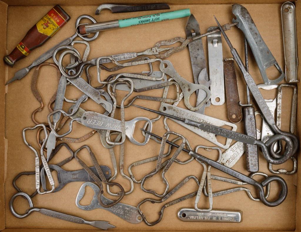 Vintage Advertising Bottle Openers: Variety of advertising bottle openers including Easslinger's Beer 'beer bottle' opener, and Manheim PA bottle opener pencil.