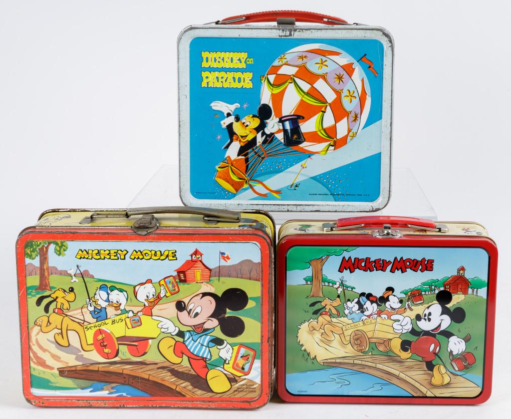 Vintage Walt Disney Metal Lunch Boxes: 3 Vintage metal lunch boxes, including 2 Mickey Mouse and 1 Disney on Parade, wear commensurate with age and use.