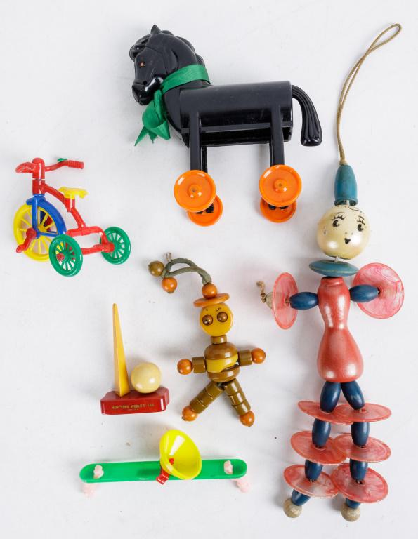 Vintage Bakelite, Wood & Plastic Toys: Bakelite bead toy figure (has damage to middle torso bead, and Bakelite NY World's Fair souvenir, wood and plastic clown bead doll, up and down spin around see saw, Ideal tricycle and unmarked rolling