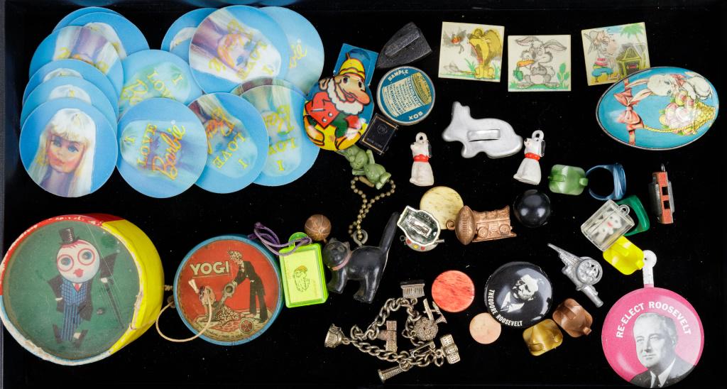 Vintage Barbie, Cracker Jack & Dexterity Games: Marx tin 'Yogi' beheading trick puzzle, 16 Barbie holographic stickers, Cracker Jack and other premiums, Tiddlywinks, egg dexterity puzzle, early black cat key chain, troll cards and more.