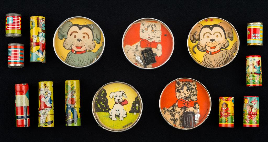 Vintage Tin Whistles & Dexterity Puzzles: 10 Tin litho whistles and 5 dexterity puzzles including 2 marked 'Made in US Zone Germany.