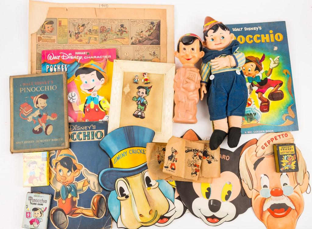 Vintage Disney Pinocchio Collectibles: Including 1 Soaky, 1 Knickerbocker doll, 3 ephemera books, 1 cartoon, 3 card games, 1 pencil case, 1 'Pocket Puppet' NIP, 1 framed picture and 1 Jiminy Cricket premium.