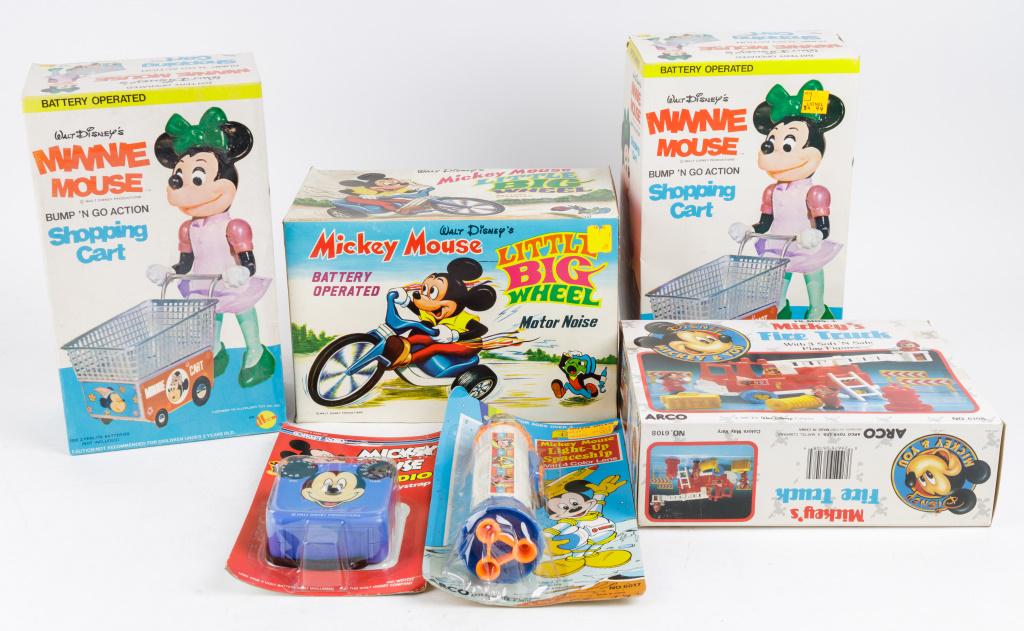 Vintage Mickey & Minnie Mouse Toys NIB: Including Arco Mickey Mouse firetruck NIB, Arco Mickey Mouse light up space ship, Mickey AM radio, Allco Minnie Mouse BO shopping carts, and Marx Mickey BO Little Big Wheel motor noise, all NIB.