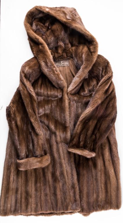 Vintage Flemington Mink Fur Coat: Flemington brand hooded mink fur coat, approx 40"L from collar to hem and 21" from shoulder to shoulder, with 3 Dasco opening clasps and the name 'Stephanie' embroidered on right side interior.