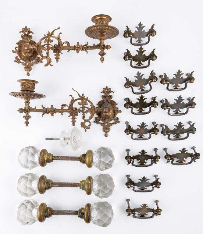 Antique Hardware & Glass Doorknobs: 12 Metal dresser/drawer pulls, pressed glass knob (has chip to edge), 3 cut glass door knobs, and set of 2 foldaway wall mounted candlesticks approx 9.25"L.