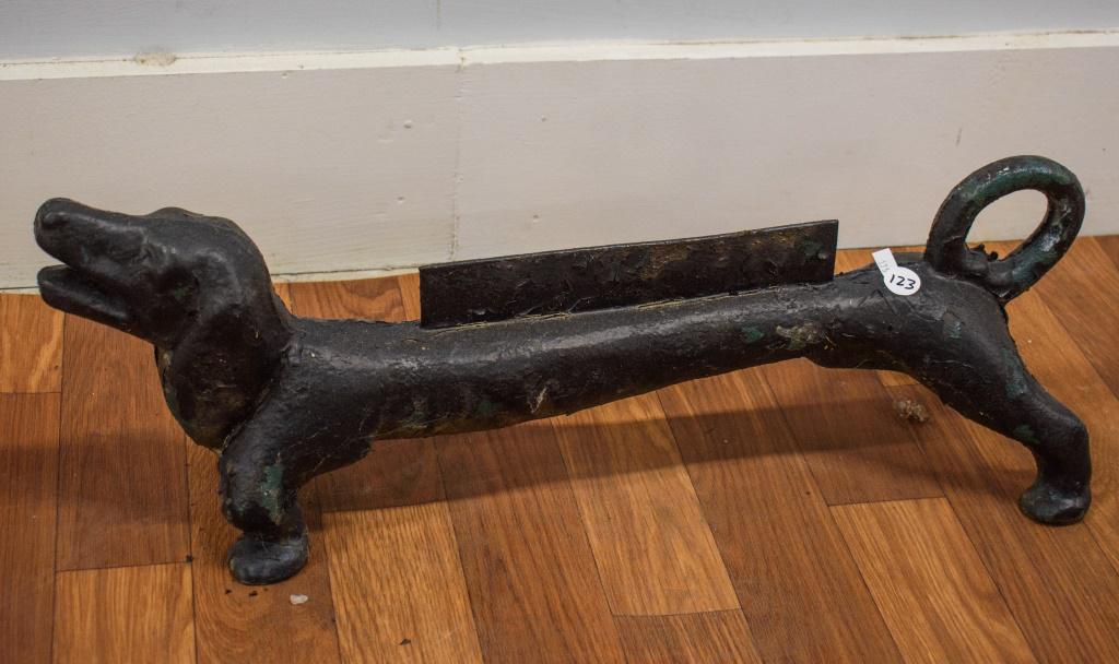 Black Dog Boot Scraper: Dacsund dog style black cast iron Boot Scraper / Door Stop. Paint history black over what appears to be original green. Approx 7" H x 21" L x 7" W.