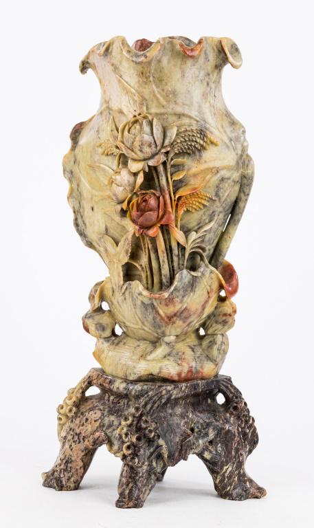 Oriental Carved Soapstone Vase: Carved soapstone vase with flowers, carved soapstone base with koi foot, marked inside with backwards 'e', has chip to front lip of lower petal, approx 15"H x 7.5"W.