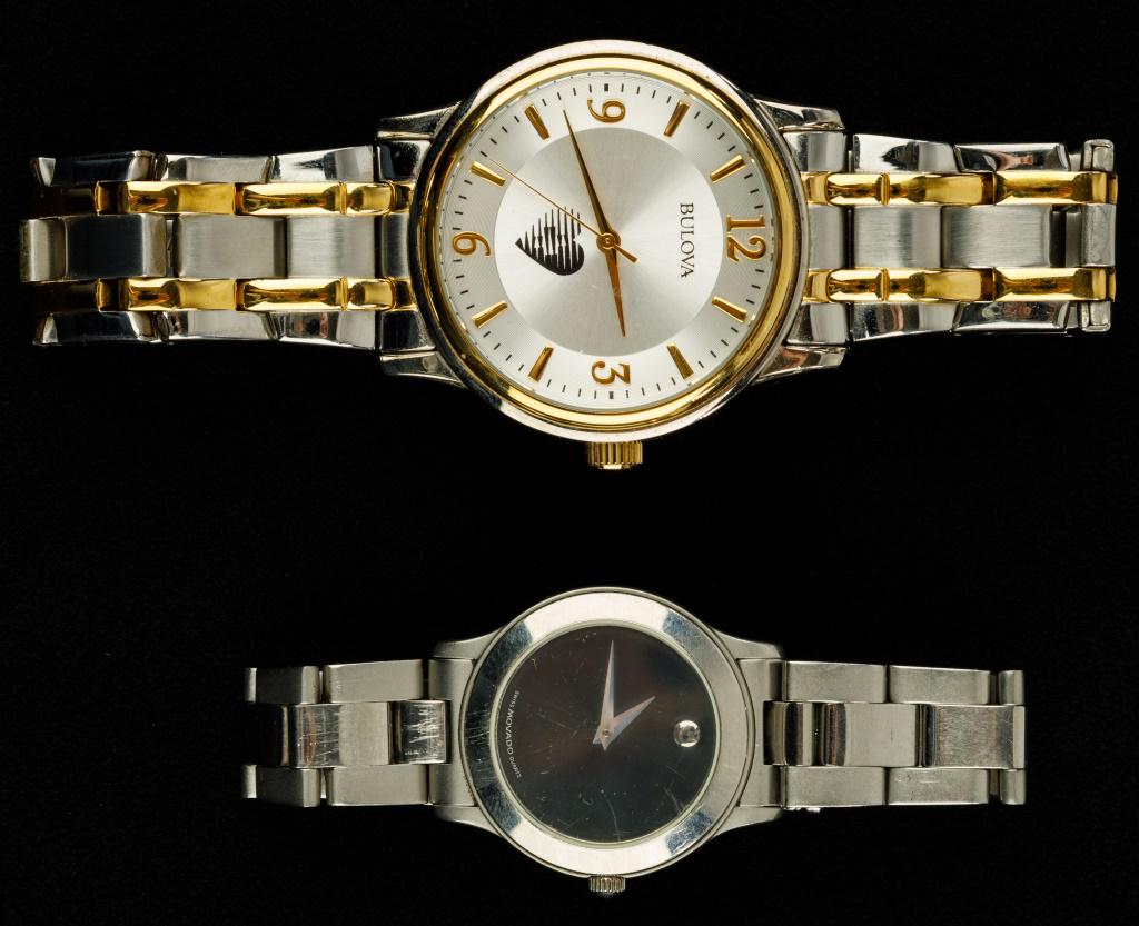"Movado" and "Bulova" Watches: "Movado" black face Swiss water resistant stainless steel strap watch and "Bulova" gold tone and stainless steel heart, detail water resistant watch as found condition.