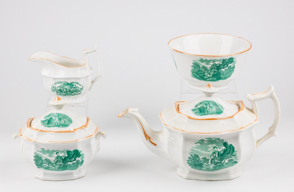Early 19th C English Porcelain Tea Set: Teapot (approx 7" H), creamer, covered sugar and waste bowl. White with green pastoral scenes. Condition: A spider crack in bottom of teapot.