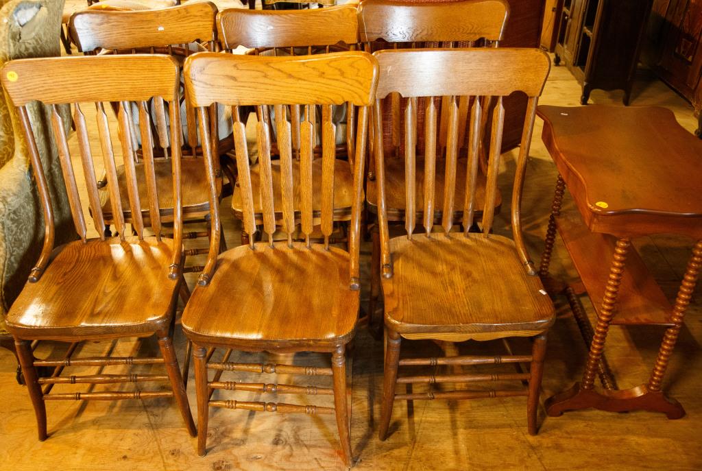 Six Golden Oak Side Chairs, Table: Chairs are Attributed to Red Lion, PA with at least 3 with Cigar Label Band brackets (assembled set). Lot also comes with a soft wood drop leaf end table with barley twist legs measuring 28" high x 26