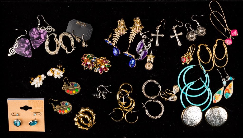 Costume Earrings: Jewelry with 26 costume earrings including novelty tea cups, artist paint pallet and brush, musical note, pearl styles, ruby colored, emerald colored, Austrian crystal type stone, and various hoops, a