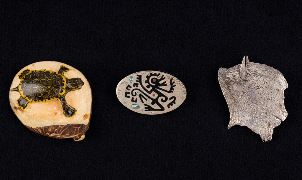 Vintage Sterling Silver Jewelry Collection: Native American "KO" signed sterling bison pin, Mexican sterling onyx inlay pin, and carved hand painted turtle pendant.