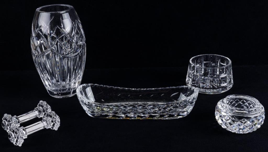 Waterford Crystal and Others (6 pcs): 6 pieces of crystal includes a celery, ashtray and small bowl all signed Waterford. There is also two unmarked knife rests and 1 vase. The vase measures approx 8" H and the celery is approx 9 1/2" L. 