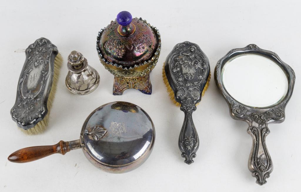 Antique Dresser Items: Antique dresser items include two brushes and mirror set that are monogrammed and marked Victor Silver Company, 1907. One silent butler by EPC Poole Silver, Taunton, Mass. One silver cased glass perfu
