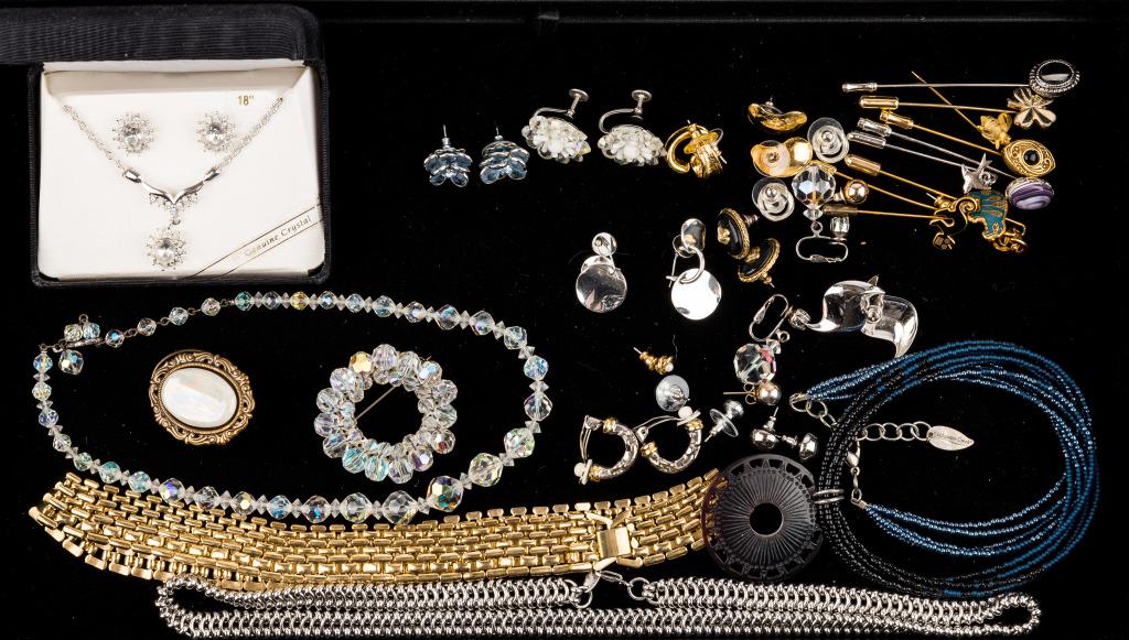Costume Jewelry Collection: Costume jewelry to include 9 stick pins (bear and cat are stamped MMA 1985), 5 necklaces (one silver tone stamped Trifari), 2 brooches (one stamped Jeri-Lou), one necklace and earring set, and 14 pair