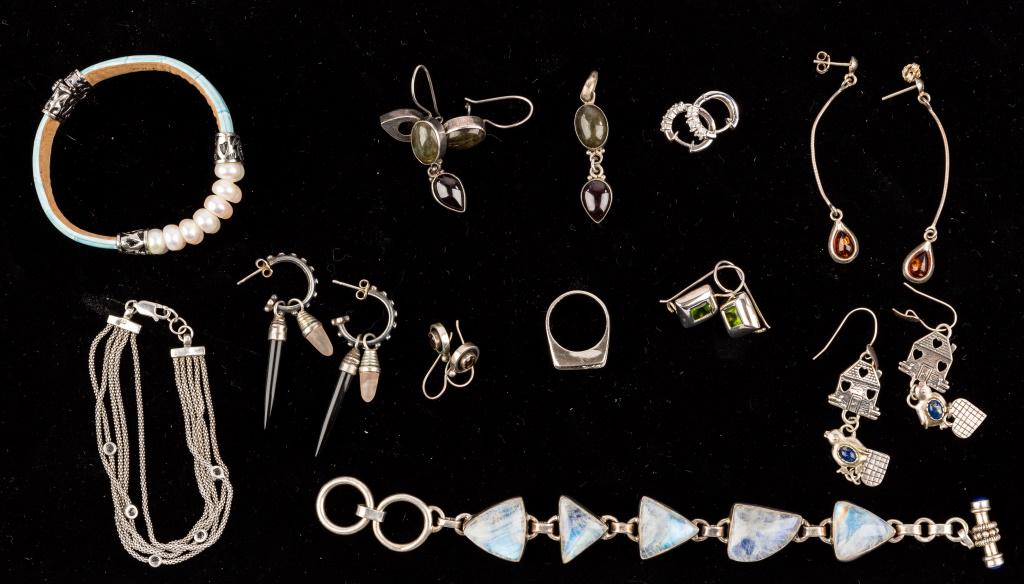 Sterling Silver Jewelry: Matching sterling and stone pendant and earrings and 6 additional silver earring sets. Pearl and leather bracelet with 925 hardware. Chain link bracelet with moonstone is approx 8" long and unmarked.