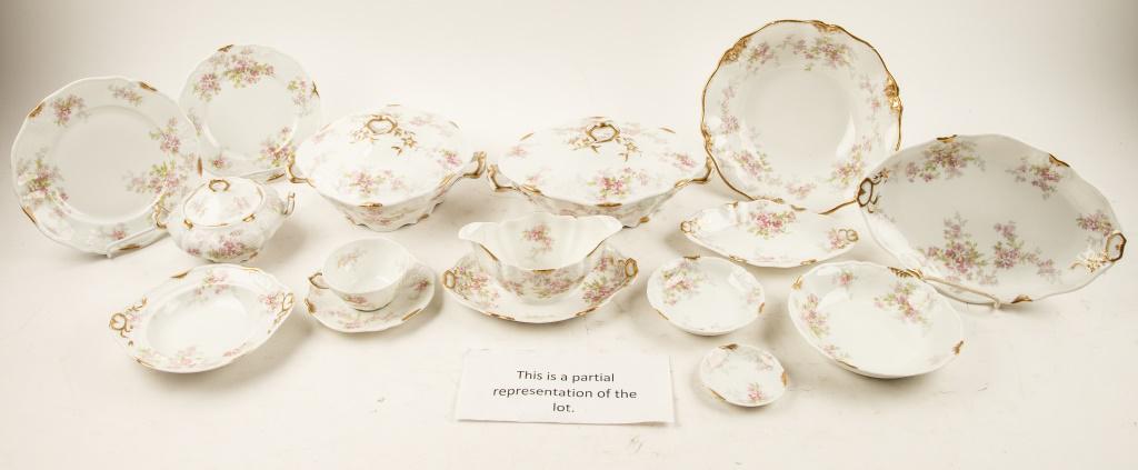 Antique C. Ahrenfeldt Limoges France Porcelain: Charles Ahrenfeldt France Depose porcelain partial set including 12 berry bowls, 10 butter pats, 8 soup bowls, 10 saucers, 11 cups, 12 salad plates, 10 dinner plates approx 8.5" diam, creamer, sugar, 