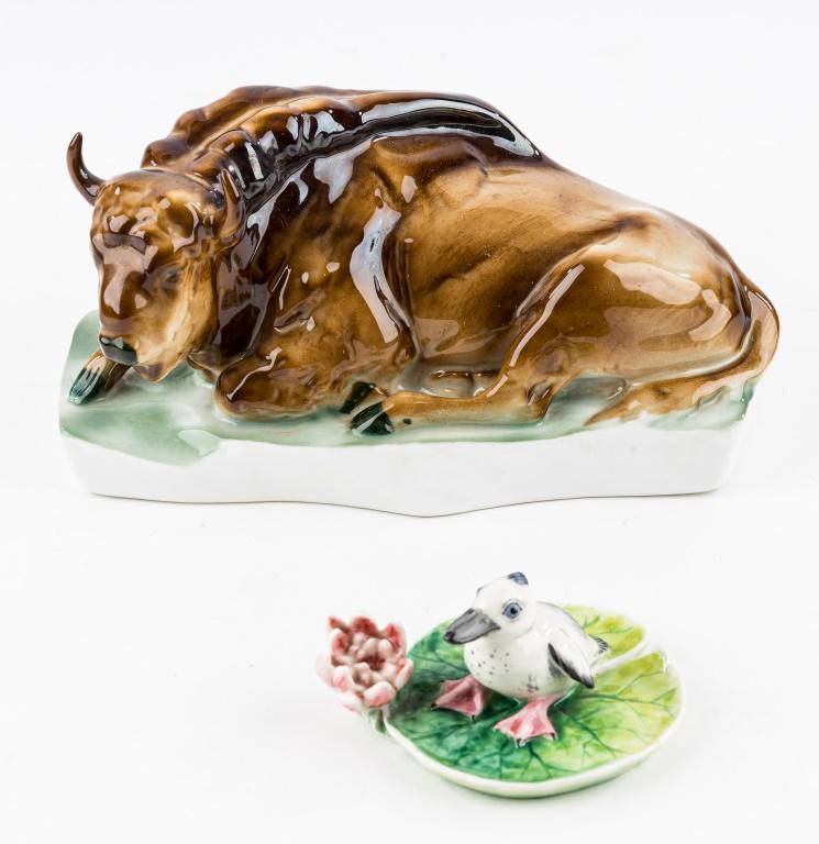 Zsolnay Porcelain Bull, Nymphenburg Duckling: Zsolnay porcelain bull / buffalo with mark on bottom, approx 8"L, and Nyphenburg porcelain duckling on blooming lily pad approx 2"H, with mark on bottom and 2031.