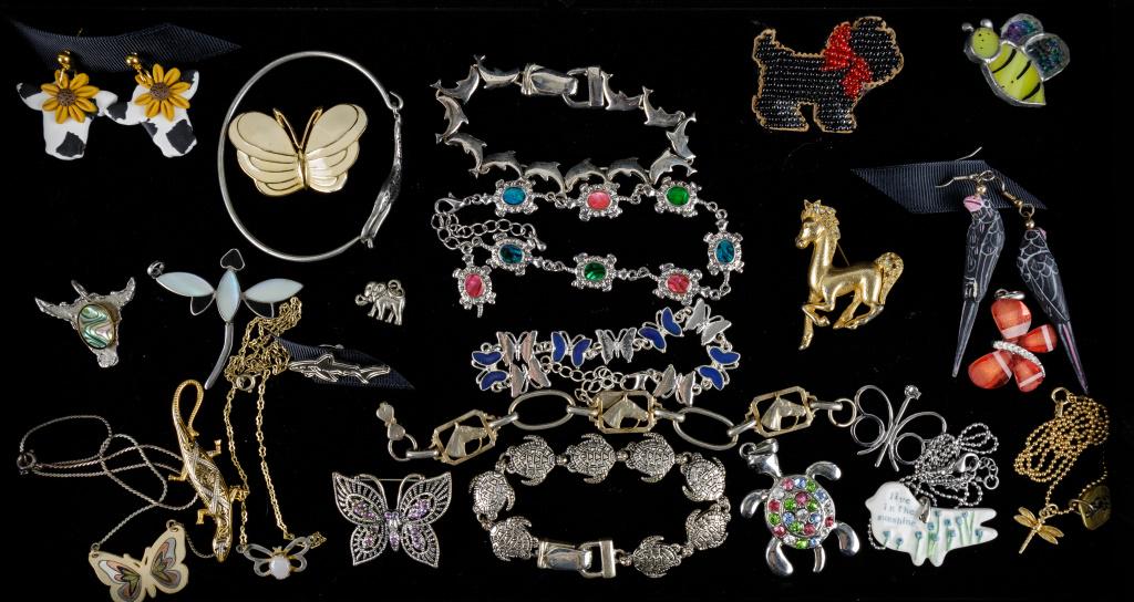 Figural Costume Jewelry: 25 Items featuring 2 turtle bracelets, butterfly, horse, dolphin and giraffe bracelets, butterfly necklaces and pins, turtle, dragonfly and steer pendants, 2 butterfly pendants, lizard pin and more.