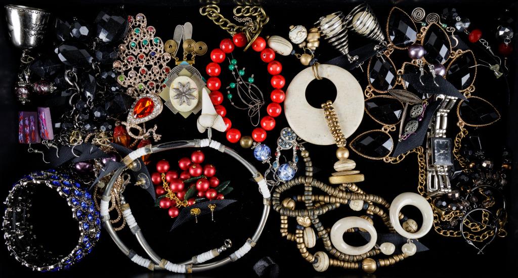 Mixed Group of Costume Jewerly: 26 Items of jewelry featuring a coral bracelet, malachite bead earrings, shark tooth choker, a 4" statement peacck pendant on a necklace, earrings, necklaces and more.