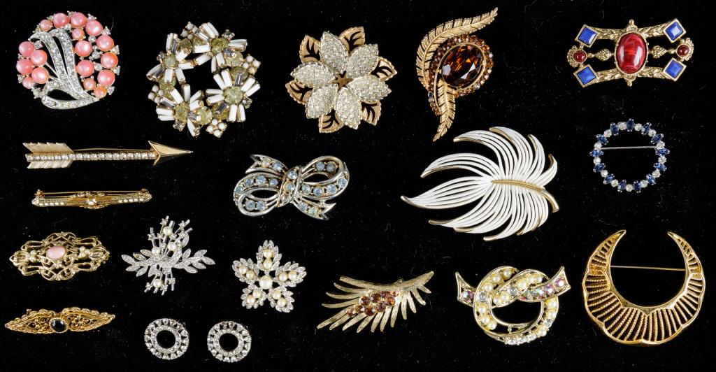 Monet, Trifari & Other Costume Jewelry: Monet gold tone pin, Trifari amber colored stone with fronds brooch (missing 2 stones), faux pearl, rhinestone, and other costume jewelry.