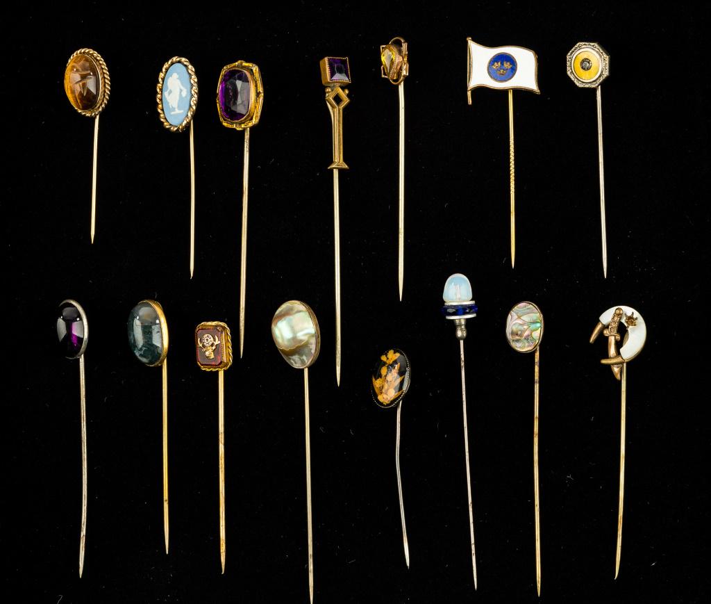 Vintage Stick Pins: Vintage stick pins including gold filled, sterling silver, Jasperware, 1 testing positive for amethyst, tigers eye, glass, abalone, possibly Masonic, and other stick pins.