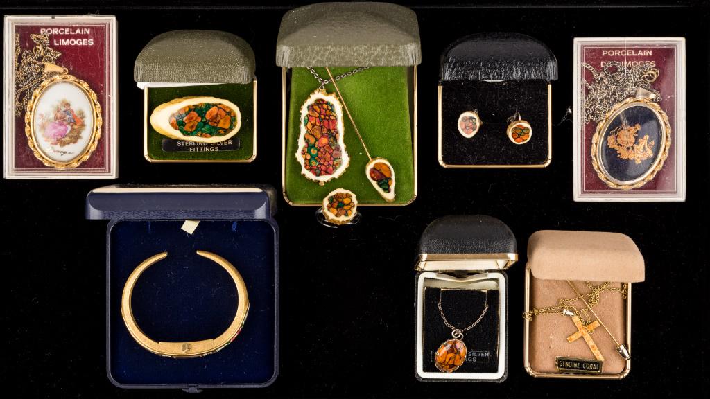 Heathergems, Coral & Limoges: Scottish Heathergems necklaces, pins, earrings, ring, stick pin (some with sterling), coral pineapple stick pin and cross necklace, Bucherer watch, and 2 porcelain Limoges necklace.