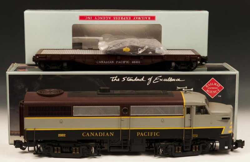 REA Canadian Pacific Locomotive and Flat Car: REA-22002 Canadian Pacific ALCO FA-1 Diesel Locomotive and REA-46202 Canadian Pacific Flat Car; both with box