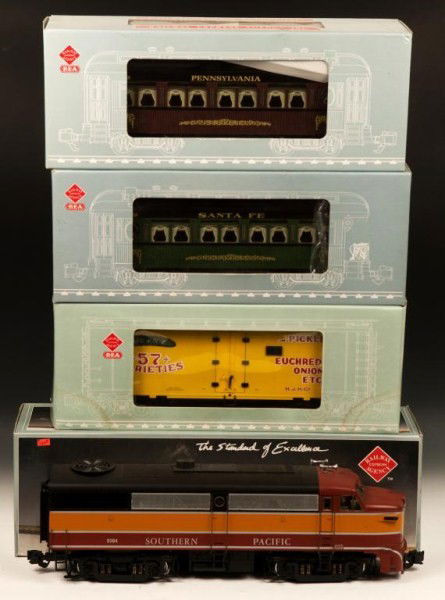 REA Canadian Pacific Locomotive and Multiple Car L: REA-22002 Canadian Pacific ALCO FA-1 Diesel Locomotive with REA-31205 ATSF Santa Fe Observation Car, REA-31001 PRR Passenger Car and REA-46204 Heinz Reefer Car; all cars with box